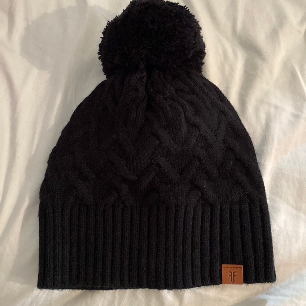 Woman’s black beanie